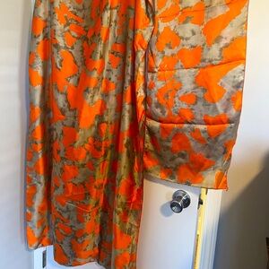 Pretty orange and gold Kaftan.